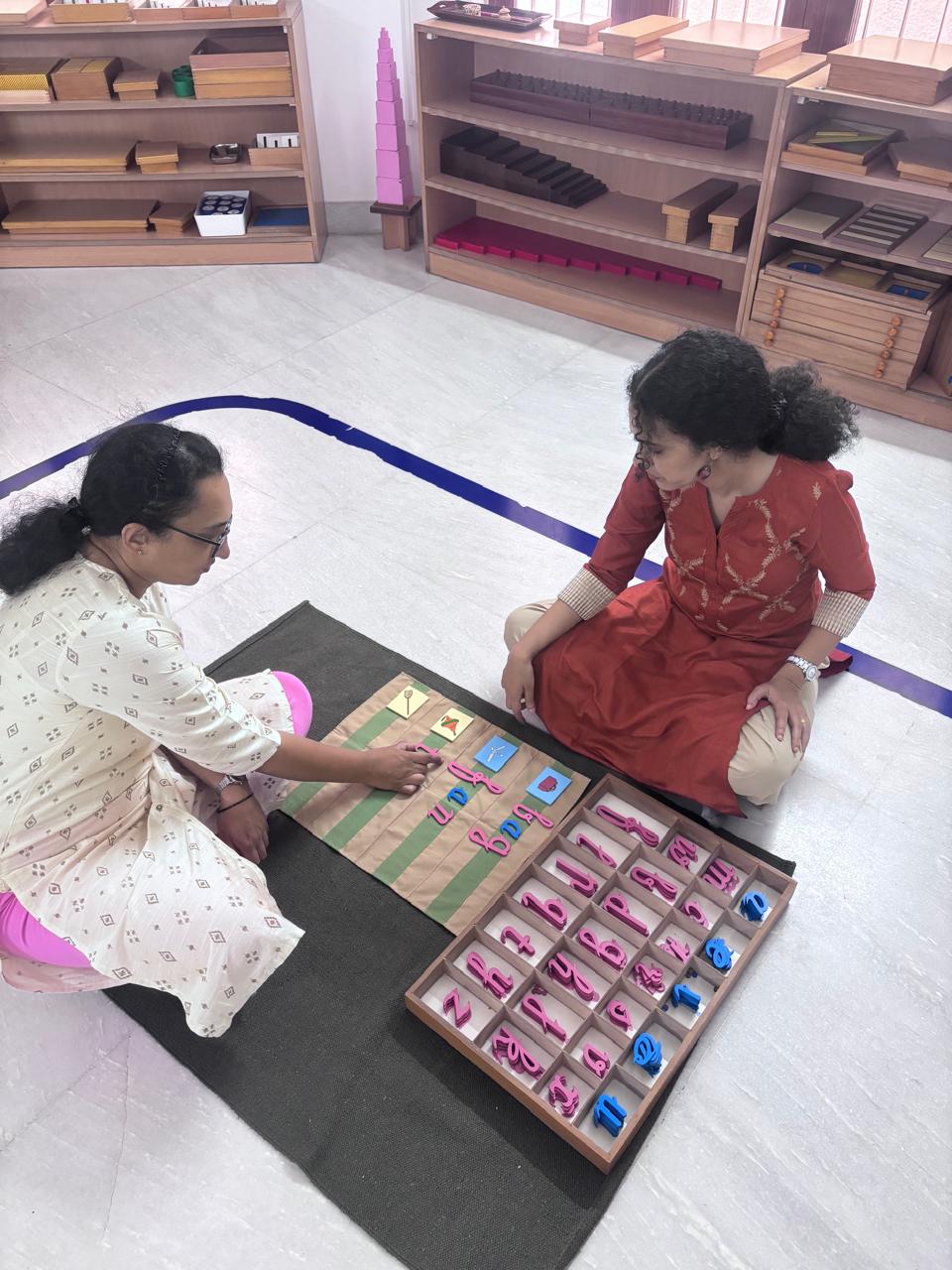 FTTA Montessori trainee practising a bead board material during in-person teacher training